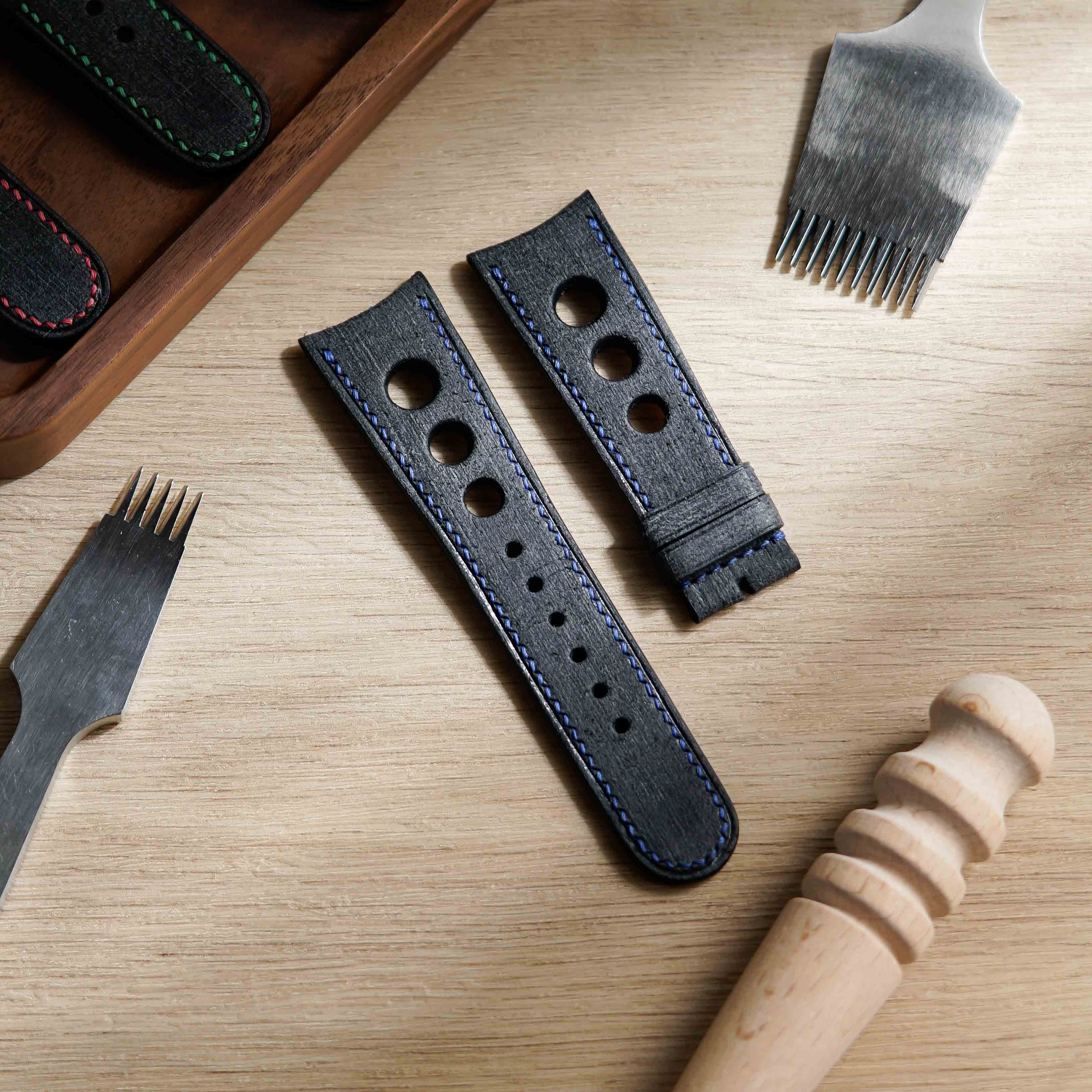 Hand made babele leather strap in black with blue stitching for M.A.D.