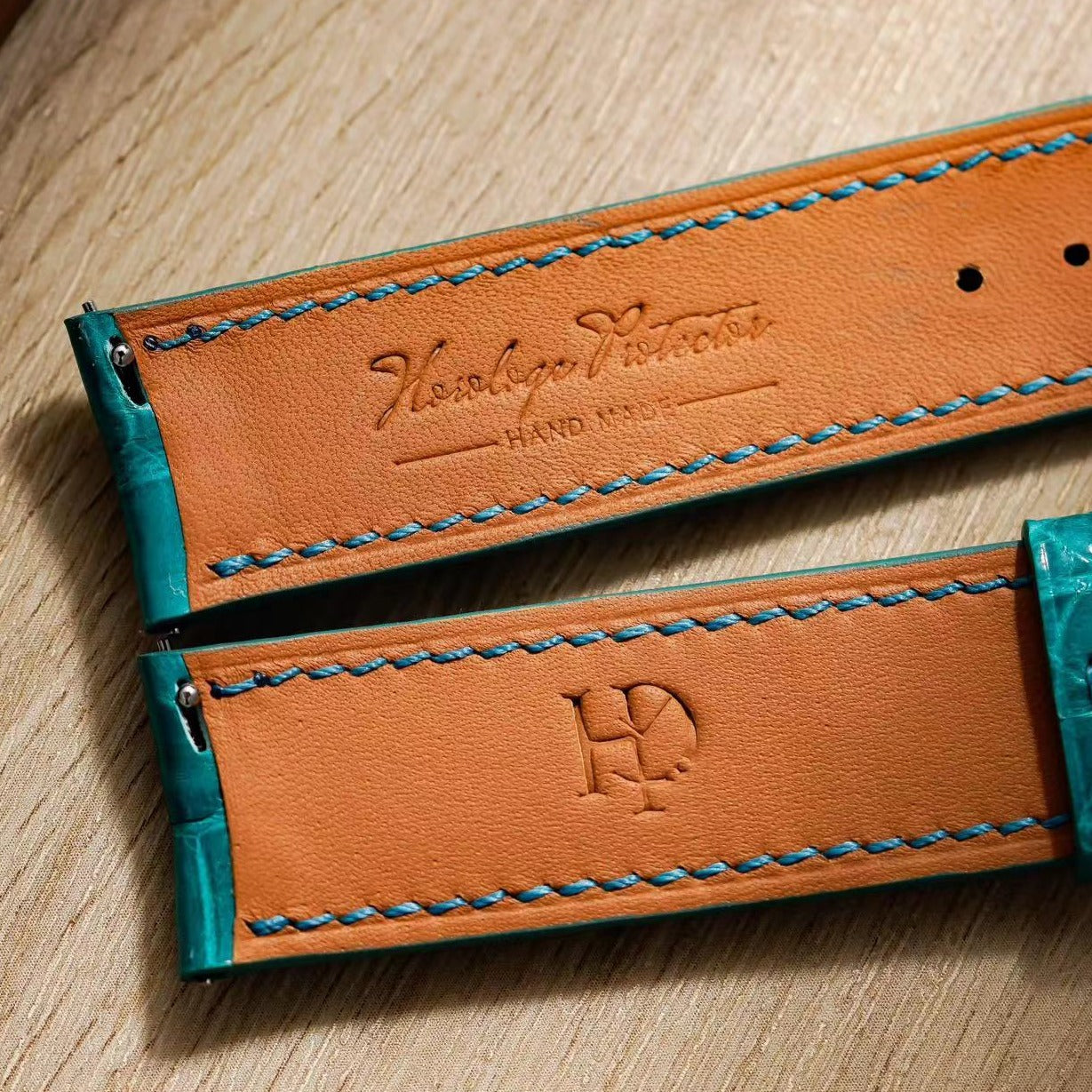 Hand made alligator strap in polished Bleu Paon